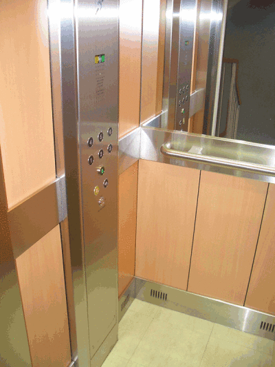 An example of a lift refurbished by F & D Lift Interiors, with the help of a Striebig vertical panel saw
