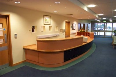 This reception desk is a typical example of the fine work produced by Dixon Timber Products - with the help of Striebig saws.