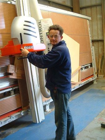Wessex Homes' mill team leader Jonathan Eveleigh sets up the Striebig Control vertical panel saw.